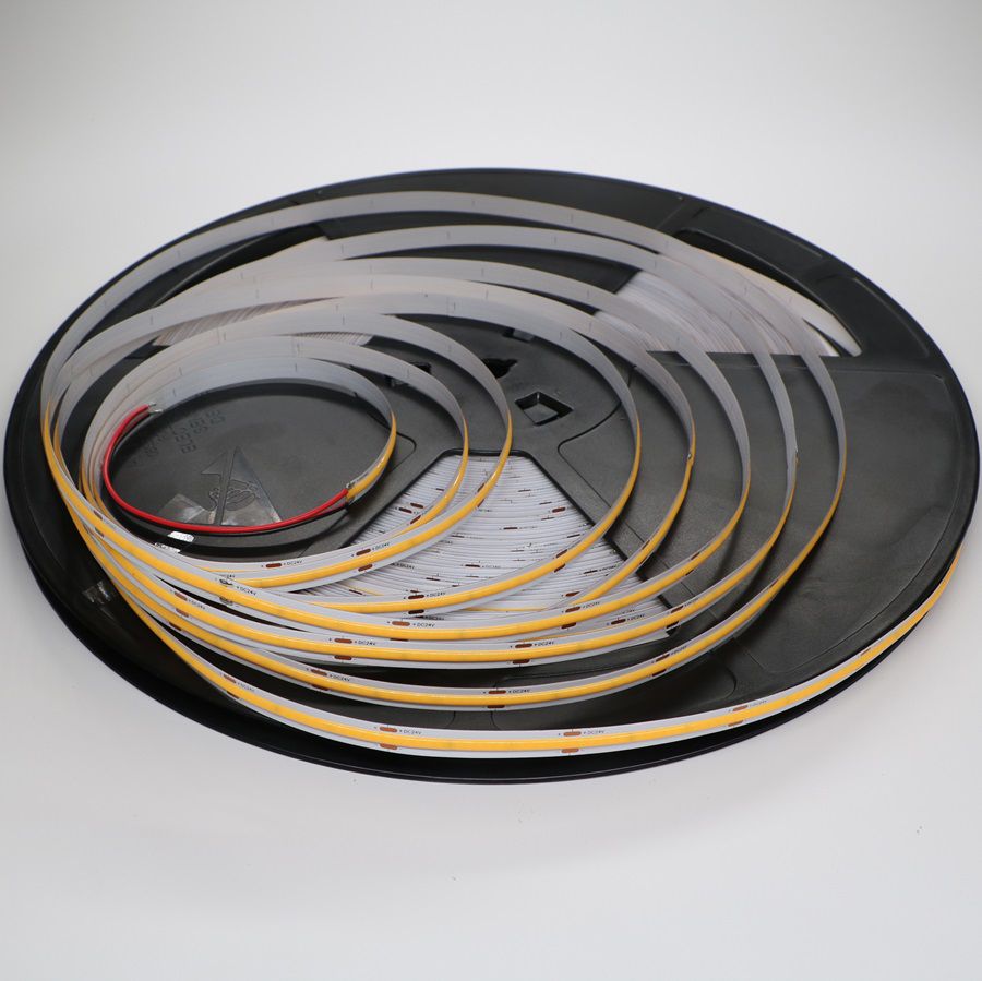Ultra-long COB LED strip loosely coiled on a reel